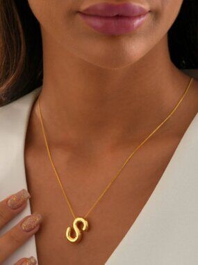Gold S-shaped necklace